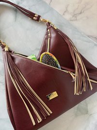 The Angler Slouchy Handbag - a rich, edgy, handbag with tassels + angled zipper giving it serious personality  - in a beautiful bordeaux faux leather