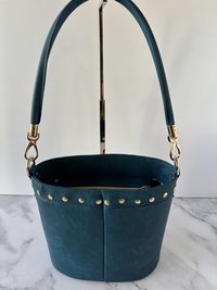 The Empowered Bucket Bag Set with Rosie vintage wartime icon inspired embroidery. Spacious, eye-catching, and designed for everyday style with attitude.