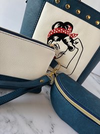 The Empowered Bucket Bag Set with Rosie vintage wartime icon inspired embroidery. Spacious, eye-catching, and designed for everyday style with attitude.