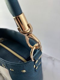 The Empowered Bucket Bag Set with Rosie vintage wartime icon inspired embroidery. Spacious, eye-catching, and designed for everyday style with attitude.