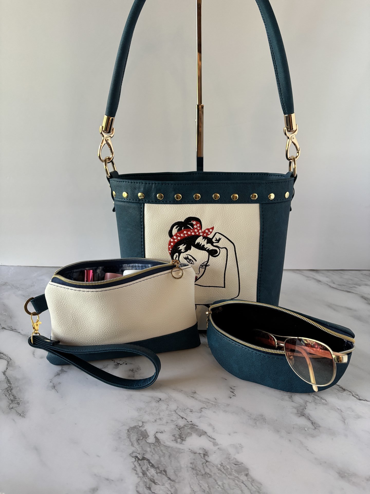 The Empowered Bucket Bag Set with Rosie vintage wartime icon inspired embroidery. Spacious, eye-catching, and designed for everyday style with attitude.